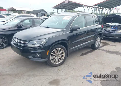 2014 Volkswagen Tiguan Sel z USA, uszkodzony, nr VIN WVGBV3AX0EW601416